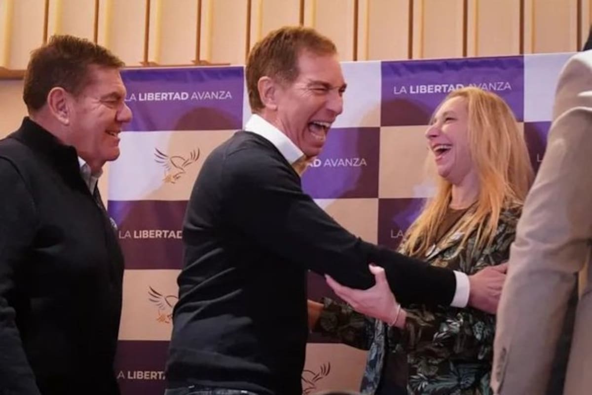 Montenegro y Santilli, con Karina Milei