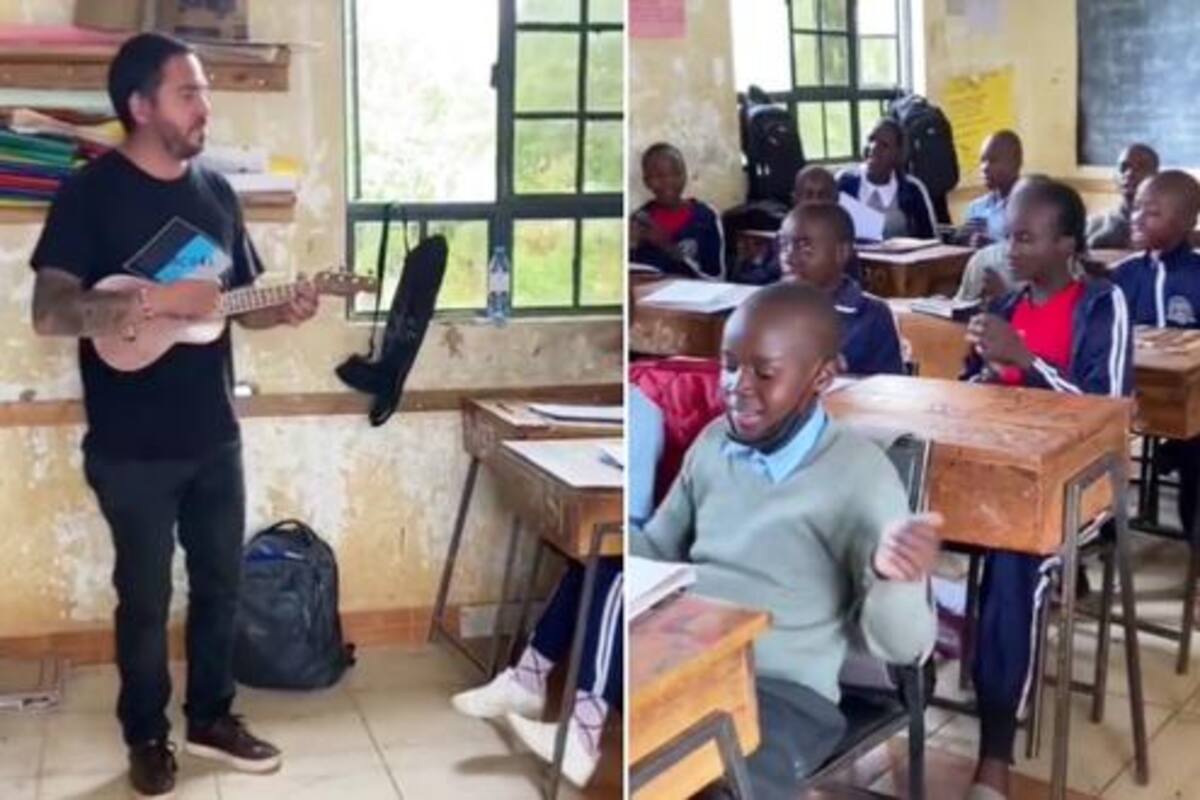 Nadab Sandoval con sus alumnos cantando “El baile de los que sobran”