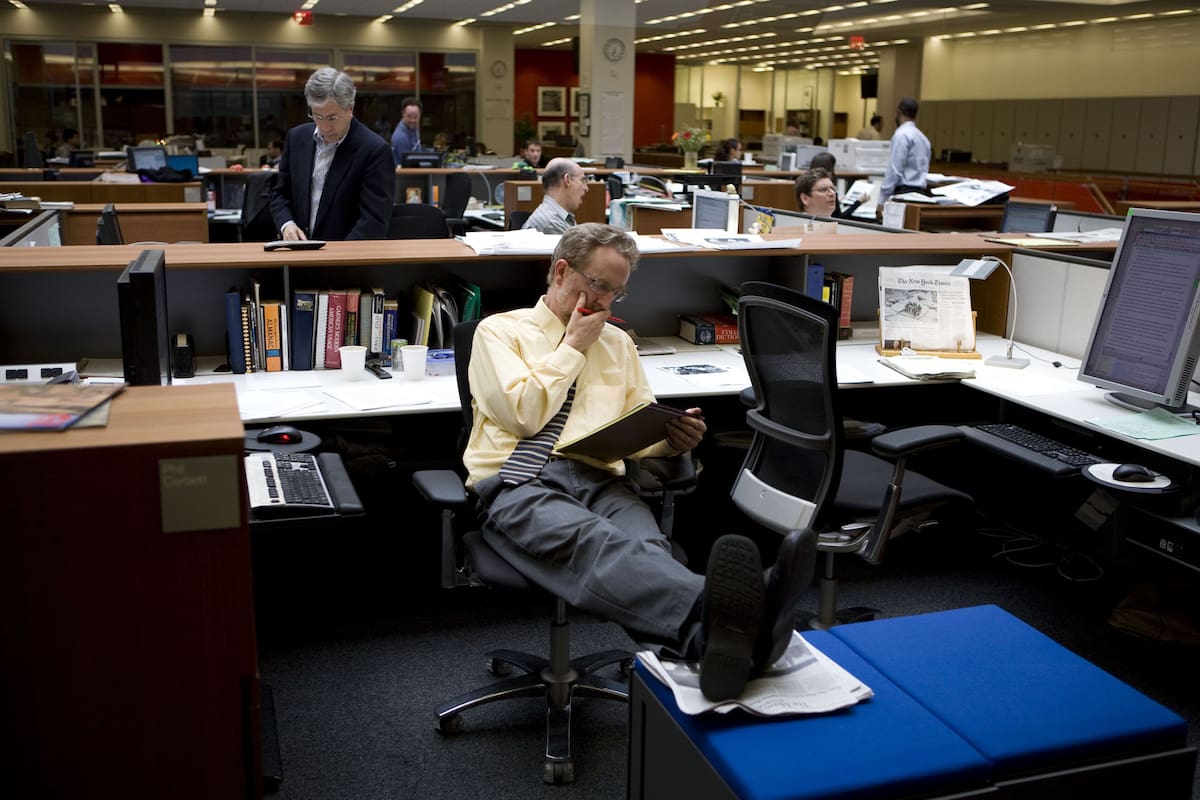 NEW YORK - MAY 2008: The newsroom at the New York Times building May, 2008 in New York City. The newsroom is mostly active from 6pm when the editors begin working on the front page of the newspaper. (Photo by Jonathan Torgovnik/Getty Images)