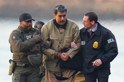 NEW YORK, NY - JANUARY 5: Nicolas Maduro is seen in handcuffs after landing at a Manhattan helipad, escorted by heavily armed Federal agents as they make their way into an armored car en route to a Federal courthouse in Manhattan on January 5, 2026 in New York City. (Photo by XNY/Star Max/GC Images)