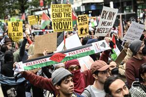 NEW YORK, UNITED STATES - OCTOBER 08: People take part in a pro-Palestinian demonstration organized by pro-Palestinian CSOs in Times Square of New York City, United States on October 08, 2023. (Photo by Fatih Aktas/Anadolu Agency via Getty Images)