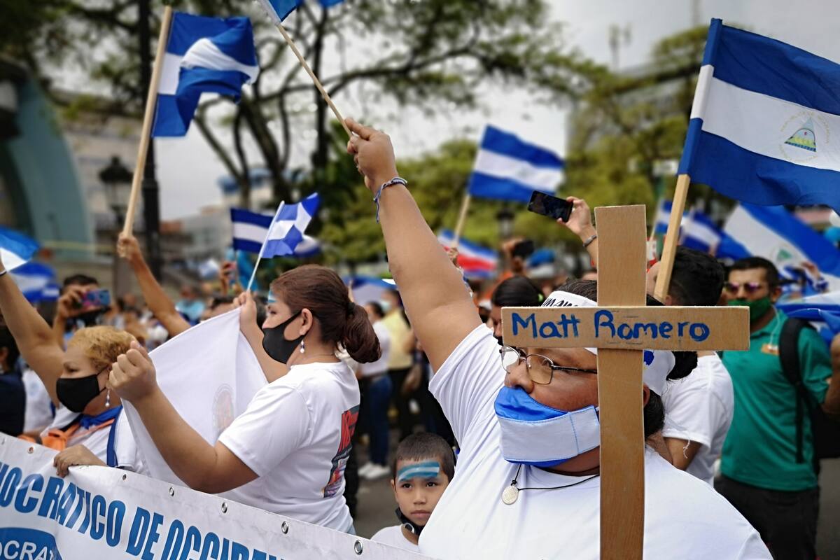 Nicaraguan citizens protest against President Daniel Ortega in San Jose, Costa Rica, Sunday, Nov. 7, 2021. Ortega seeks a fourth consecutive term against a field of little-known candidates while those who could have given him a real challenge sit in jail. (AP Photo/Javier Cordoba / AP