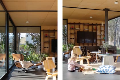 La poltrona y la sillita 'plywood', dos clásicos de Eames, vienen de la casa anterior de los dueños. Mesa baja (números primos).
