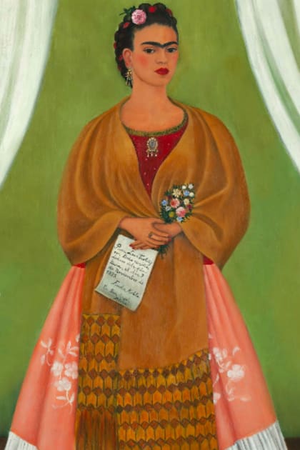 Frida Kahlo pintando el retrato de su familia