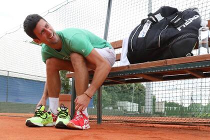 Novak Djokovic volvió a entrenarse tras recuperarse del Covid-19 y puso en duda su participación en el US Open.