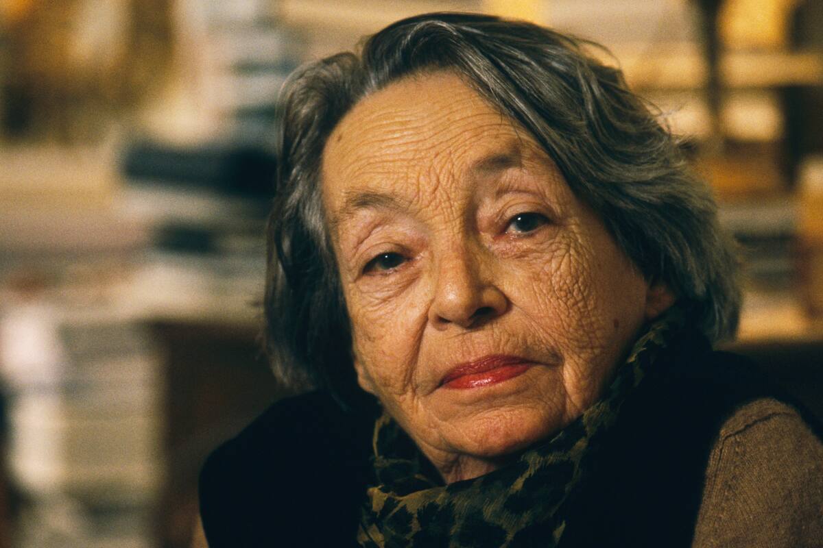 Novelist, playwright, and director Marguerite Duras (1914-1995) at home in her apartment on Rue Saint Benoit in Paris. (Photo by julio donoso/Sygma via Getty Images)