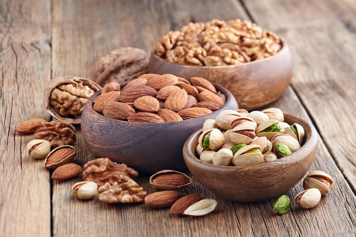 Nuts in a wooden background
