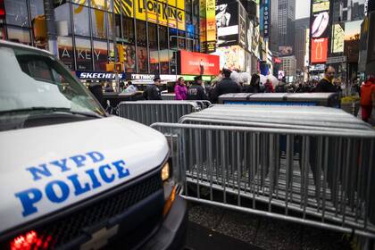 NYPD officers stand guard at Times Square on January 3, 2020 in New York City.