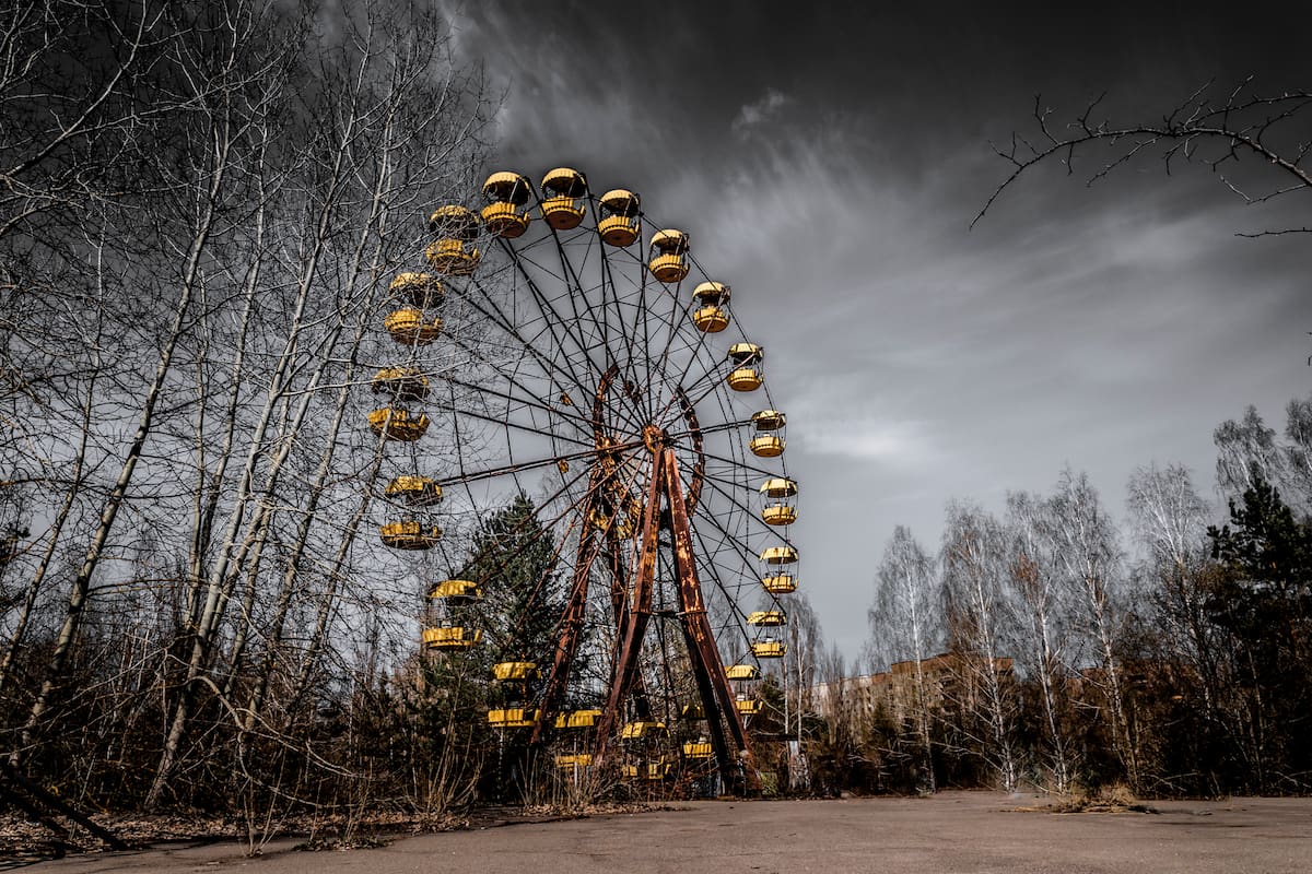 Old ferris wheel in the ghost town of Pripyat. Consequences of the accident at the Chernobil nuclear power plant
