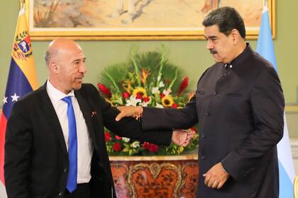 Oscar Laborde y Nicolás Maduro.