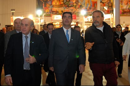 Oscar Parrili, Jorge Capitanich y Javier Grosman en la apertura de la feria