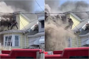 Se incendió su casa, quedaron atrapados y fueron rescatados desde el techo por su vecino