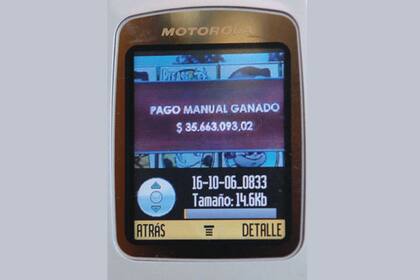 “PAGO MANUAL GANADO: $ 35.663.093,02”, podía leerse en el visor