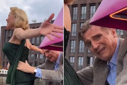 Pamela Anderson y Liam Neeson en la gira promocional de su último film