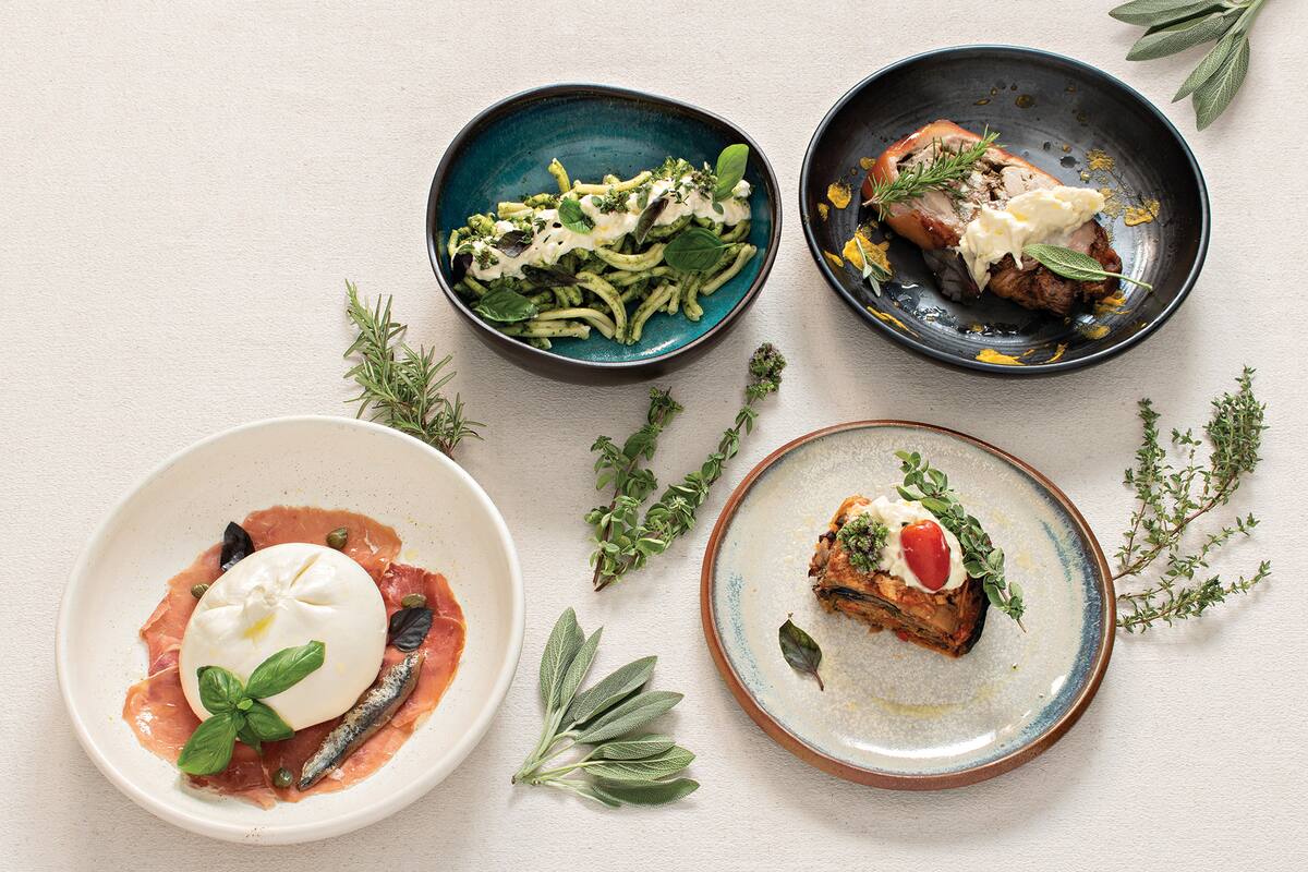 Paolo Spertino lleva la burrata al plato con distintos productos y condimentos.