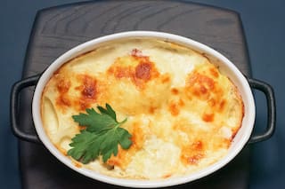 Papas con gruyere cocidas en leche