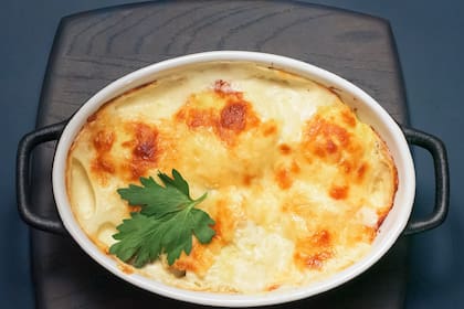 Papas con queso cocidas en leche