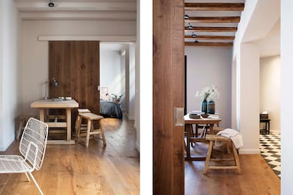 Para el portón corredizo que separa el cuarto se usó el mismo roble del parquet, pero con terminación mate. Mesa de madera (Daviu), bancos ‘Straight’ y bowls de piedra (todo de Versmissen).