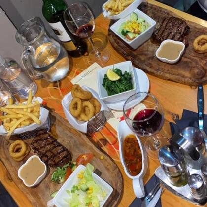 Parte del menú del restaurante Los Amigos