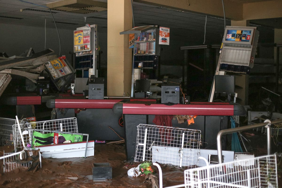 Partial view of the Swarowsky supermarket affected by heavy rains in Sinimbu, in the Vale do Rio Pardo region of Rio Grande do Sul, Brazil on May 1, 2024. The toll after heavy rains in Brazil's southern state of Rio Grande do Sul rose to eight dead and 21 missing, regional authorities said Wednesday. The deluges have displaced approximately 1,400 people in more than 100 municipalities across the state, the majority of whom civil defence officials said had been moved to shelters. (Photo by Anselmo Cunha / AFP)