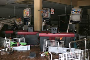 Partial view of the Swarowsky supermarket affected by heavy rains in Sinimbu, in the Vale do Rio Pardo region of Rio Grande do Sul, Brazil on May 1, 2024. The toll after heavy rains in Brazil's southern state of Rio Grande do Sul rose to eight dead and 21 missing, regional authorities said Wednesday. The deluges have displaced approximately 1,400 people in more than 100 municipalities across the state, the majority of whom civil defence officials said had been moved to shelters. (Photo by Anselmo Cunha / AFP)