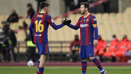 Pedri y Messi en Barcelona