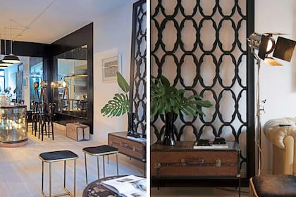 Pegada al living (la planta tiene 40m2), la cocina está sectorizada por paredes pintadas de negro. "Como le puse dos espejos que reflejaban la luz del frente vidriado, no era para nada oscura".