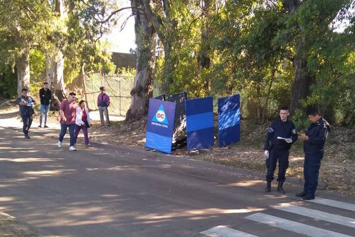 Peritos de la Policía Científica trabajan en el lugar del homicidio