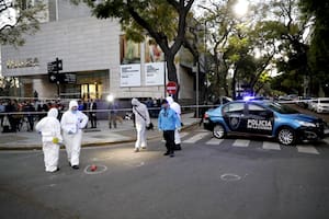 Peritos de la Policía de la Ciudad, en la escena del crimen