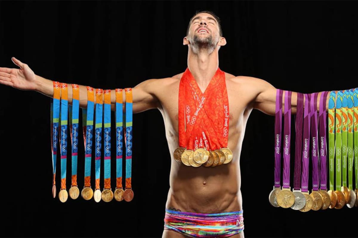 Phelps posa con todas sus medallas