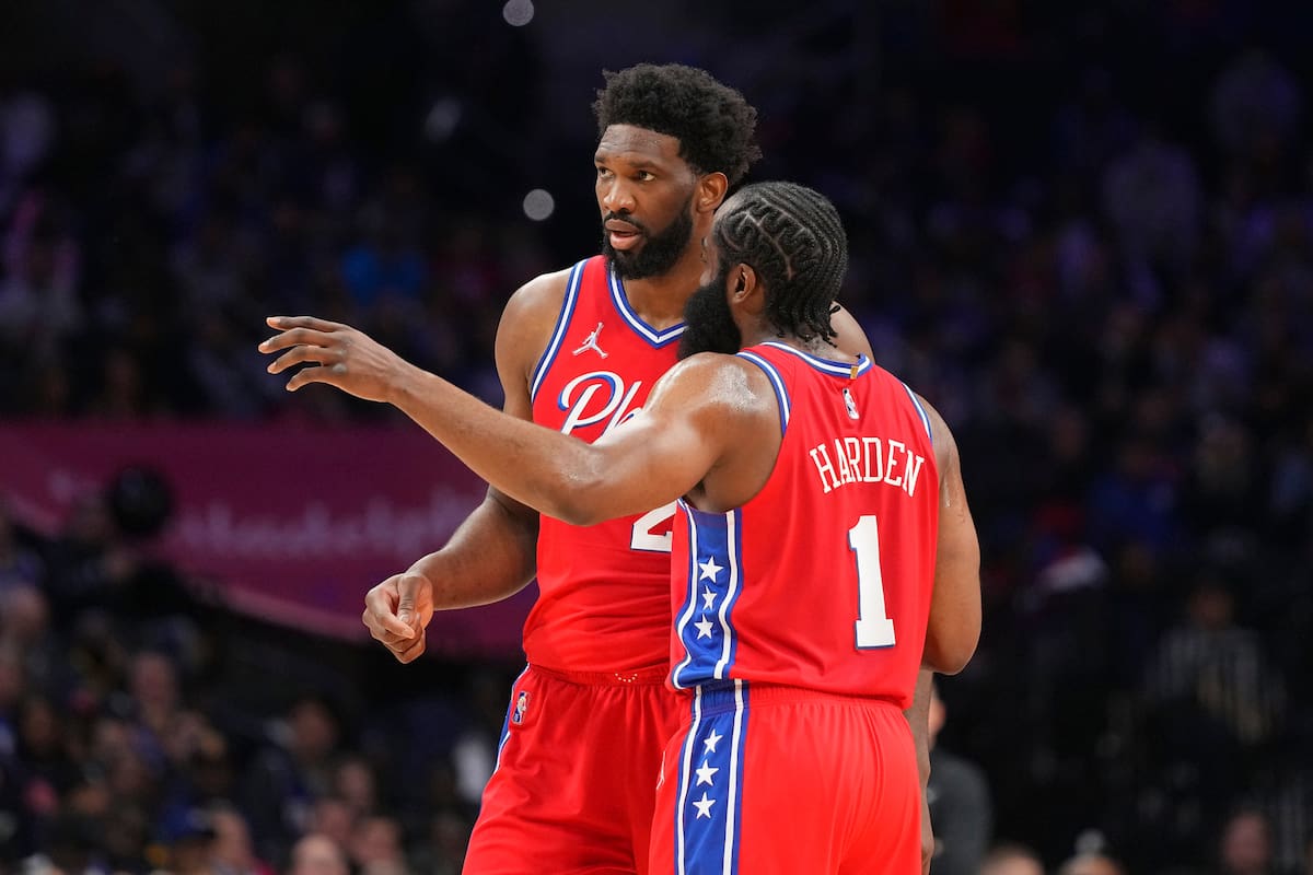 PHILADELPHIA, PA - MARCH 14: Joel Embiid #21 of the Philadelphia 76ers talks with James Harden #1 against the Denver Nuggets at the Wells Fargo Center on March 14, 2022 in Philadelphia, Pennsylvania. The Nuggets defeated the 76ers 114-110. NOTE TO USER: User expressly acknowledges and agrees that, by downloading and or using this photograph, User is consenting to the terms and conditions of the Getty Images License Agreement. (Photo by Mitchell Leff/Getty Images)