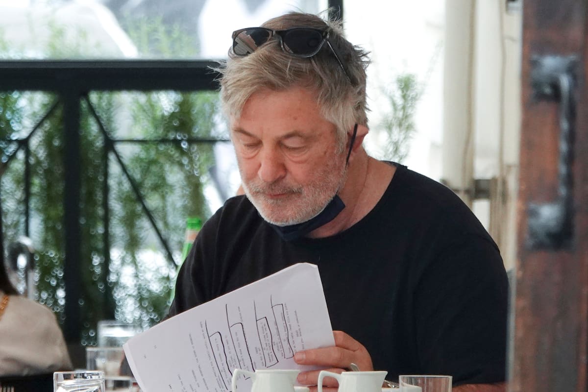 Photo © 2022 Mega/The Grosby Group
Alec Baldwin looks a little disheveled as he returns to work for the first time since a cinematographer was shot and killed on the set of his film Rust. The actor, 63, was spotted sitting outside a bar in Rome, reading the script from his new movie. He was later seen heading for a hair and make-up session, and returned looking a lot smarter. Baldwinis set to begin filming two Italian movies, Kid Santa and Billie's Magic World, according to Variety. The films are being produced by Alec and his brother Daniel Baldwin. Kid Santa and Billie's Magic World are both by Italian director Francesco Cinquemani, who previously worked with Alec on the 2015 film Andron. He also directed the 2021 film The Christmas Witch, which starred Alec's brother William Baldwin. The two films are being billed as 'live-action/animation family Christmas comedies', according to Variety. Alec has been dealing with an ongoing wrongful death lawsuit over the on-set shooting death of Hutchins. Cinematographer Halyna Hutchins, 42, died on October 21 last year when a prop gun used in the film Rust was fired by Alec after he was told it wasn't loaded, shooting her in the chest. Director Joel Souza was also injured from Baldwin's prop gun, though he survived his injuries. Earlier this month, lawyers for the film's armorer, Hannah Gutierrez, released a statement condemning the actor for pointing his firearm at crew members despite that being a violation of safety protocol. 28 Mar 2022