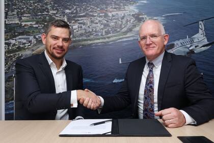 Photo of representatives from Textron Aviation and BAA Training (left to right: Marijus Ravoitis, BAA Training; Bob Gibbs, Textron Aviation) (Photo: Business Wire)