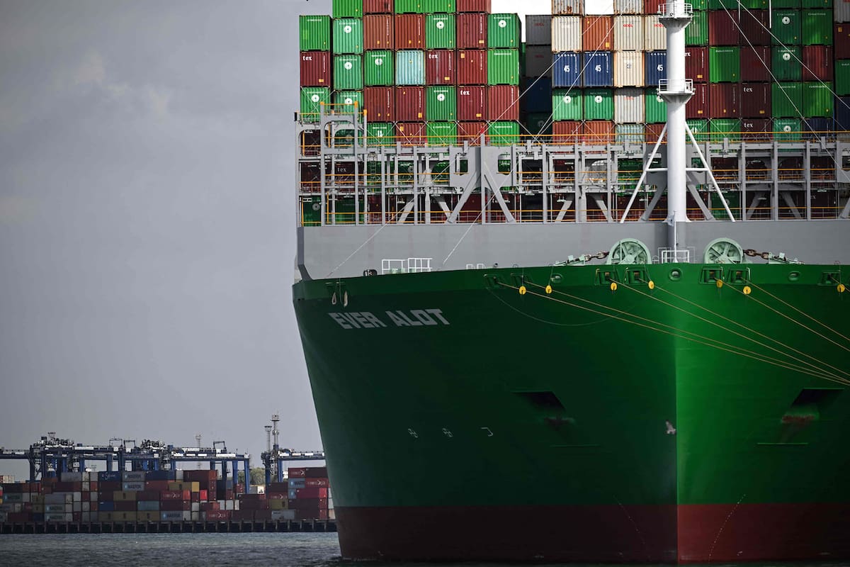 Piles of containers are pictured on the deck of the Ever Alot container ship docked at the empty UK's largest freight port, in Felixstowe, on August 22, 2022, during a dock workers eight-day strike over pay. - Workers at Britain's biggest container port, Felixstowe, began on August 21, 2022 an eight-day strike over pay, in the latest industrial action as decades-high inflation intensifies the country's cost-of-living crisis. Nearly 2,000 unionised employees at the port in eastern England, including crane drivers, machine operators and stevedores, started their walkout Sunday morning in the first strike at Felixstowe since 1989. (Photo by Ben Stansall / AFP)