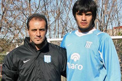 Un joven Sergio Romero, con los colores de Racing, junto a Piñero