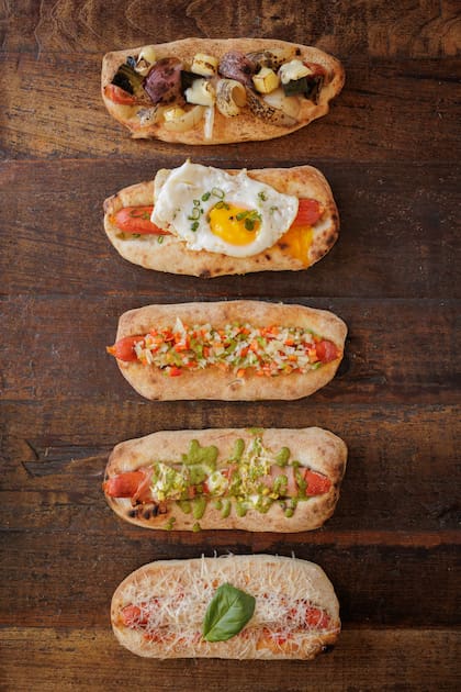 Distintos toppings pueden ser parte de las pizzas.