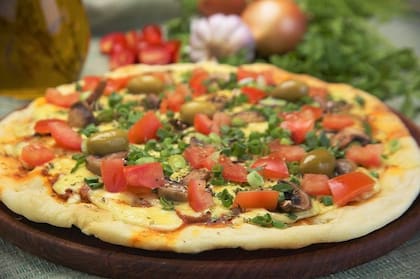 Pizzas tradicionales y sabrosas esperan en Parecchio.