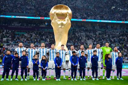 Players of Argentina sing their national anthem prior to the World Cup semifinal soccer match between Argentina and Croatia at the Lusail Stadium in Lusail, Qatar, Tuesday, Dec. 13, 2022. (AP Photo/Natacha Pisarenko)