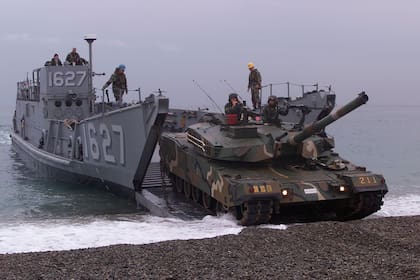 POHANG, Korea (Oct. 29, 2000) -- Landing Craft Utility 1627 prepares to land and unload Republic of Korea forces and cargo, along with U. S. soldiers from Okinawa, Japan.  The  combined amphibious beach assult at Tak San Ri Beach near Pohang, is in support of exercise Foal Eagle 2000.  Foal Eagle is the largest Joint and Combined field training drill conducted annually in South Korea, running from Oct. 25th to Nov. 3rd.  About 25,000 U.S. troops will take part in the drill, including active duty, Reserve and National Guard troops from bases in the United States and elsewhere in the Pacific.  The exercise demonstrates U.S. and South Korean military cooperation.  (U.S. Air Force photo by Tech. Sgt. James E. Lotz) (Released)