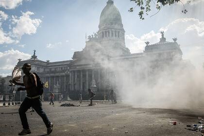 Por los disturbios se debió frenar el debate en la Cámara ese día