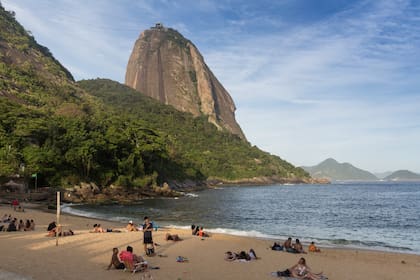 Praia Vermelha es un reducto casi escondido, a la sombra del Pan de Azúcar.