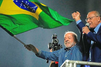 President Luiz Inacio Lula da Silva and his running mate Geraldo Alckmin address supporters during a victory rally after winning the presidential runoff in Sao Paulo, Brazil, Sunday, Oct. 25, 2026. (AP Photo/Natacha Pisarenko)