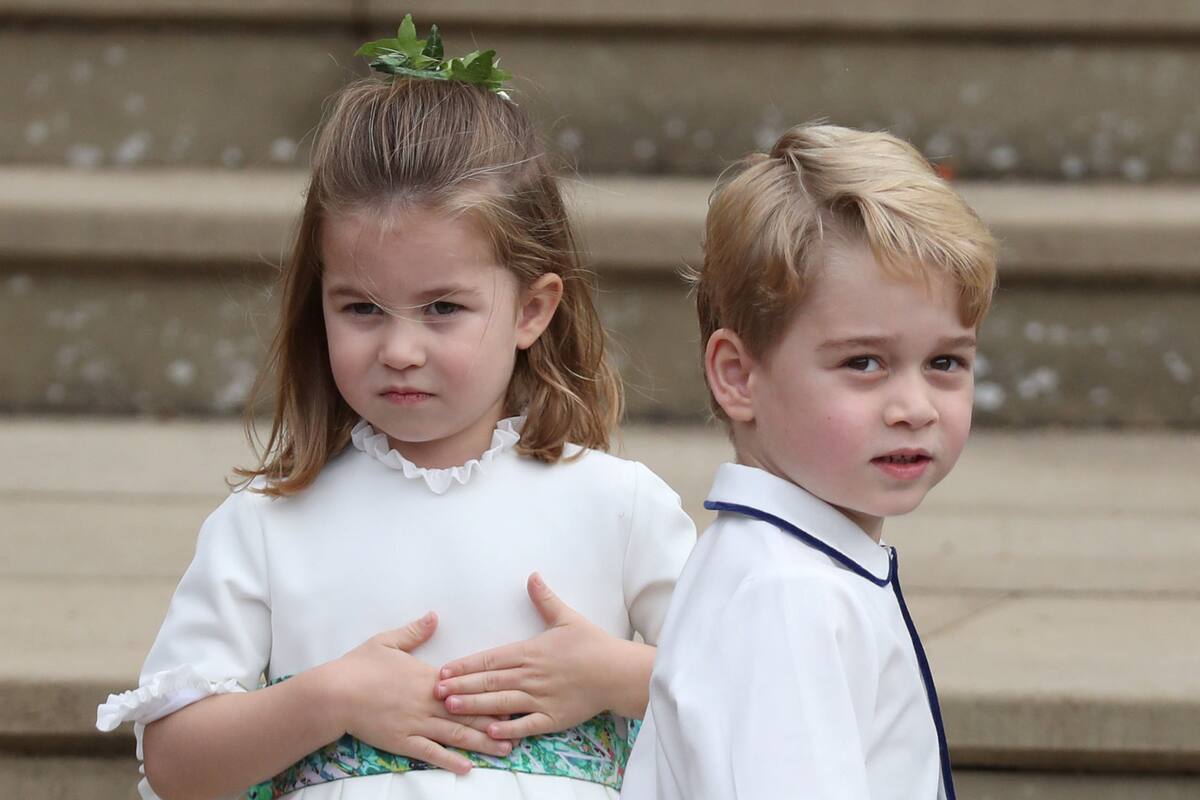 Princess Charlotte and Prince George arrive for the wedding of Princess Eugenie to Jack Brooksbank at St Georges Chapel in Windsor Castle, Britain October 12, 2018. Steve Parsons/Pool via REUTERS