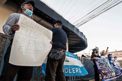 Protesta de exiliados nicaragüenses en Costa Rica (Photo by Ezequiel BECERRA / AFP)
