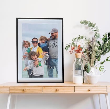 ¿Qué tal decorar las paredes con buenas fotos impresas?
