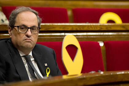 Quim Torra candidato a la presidencia de Cataluña junto a las bancas de los presos políticos independentistas