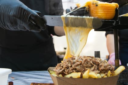 Raclette sobre papas de triple cocción de Uría Raclette