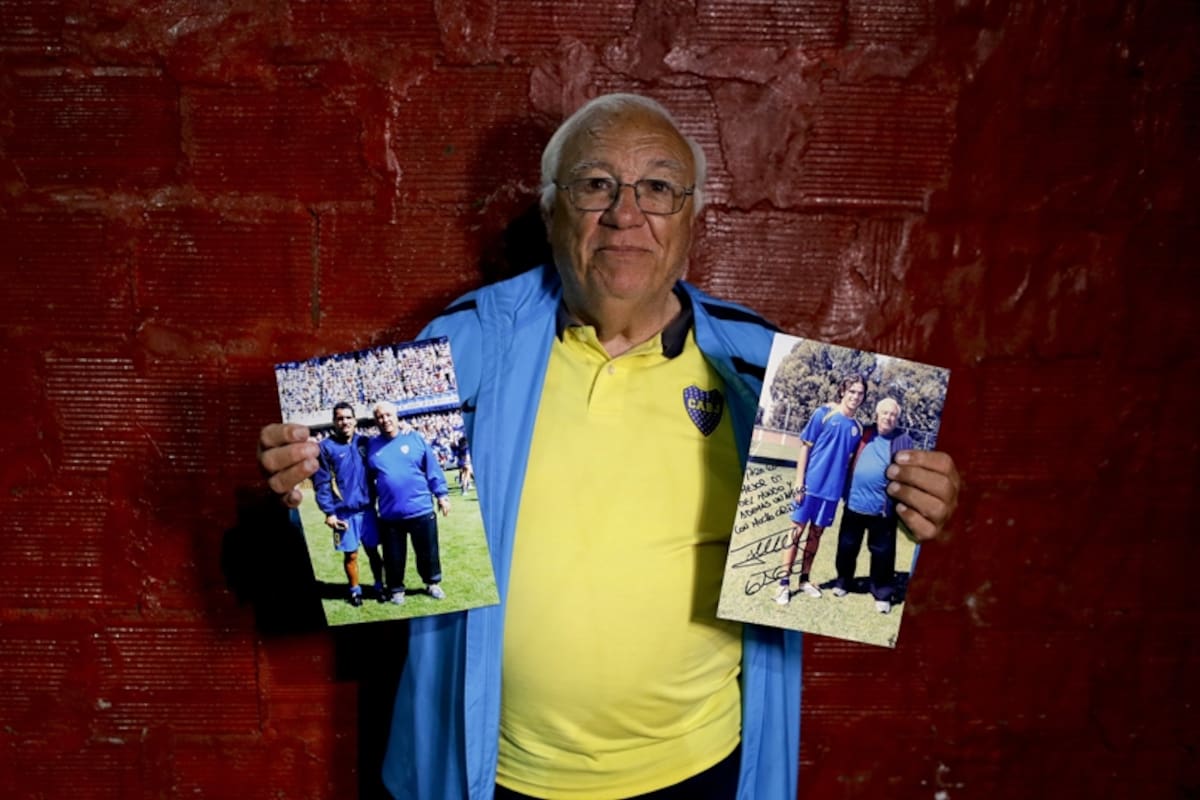 Ramon Maddoni, head scout at youth soccer academy Club Social Parque and at the Boca Juniors club children''''''''s division, poses with photos of himself with professional players Carlos Tevez and Fernando Gago in Buenos Aires, Argentina. Maddoni recalls how he promised Tevez that he''''''''d be a