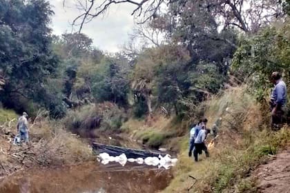 Rastrillaje en el río Tragadero, donde se encontraron presuntos restos del cuerpo de Cecilia, que Gustavo Obregón dijo haber tirado allí junto con César Sena