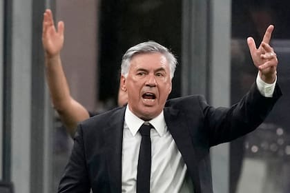 Real Madrid's head coach Carlo Ancelotti shouts during the Champions League group D soccer match between Inter Milan and Real Madrid at the San Siro stadium in Milan, Italy, Wednesday, Sept. 15, 2021. (AP Photo/Antonio Calanni)